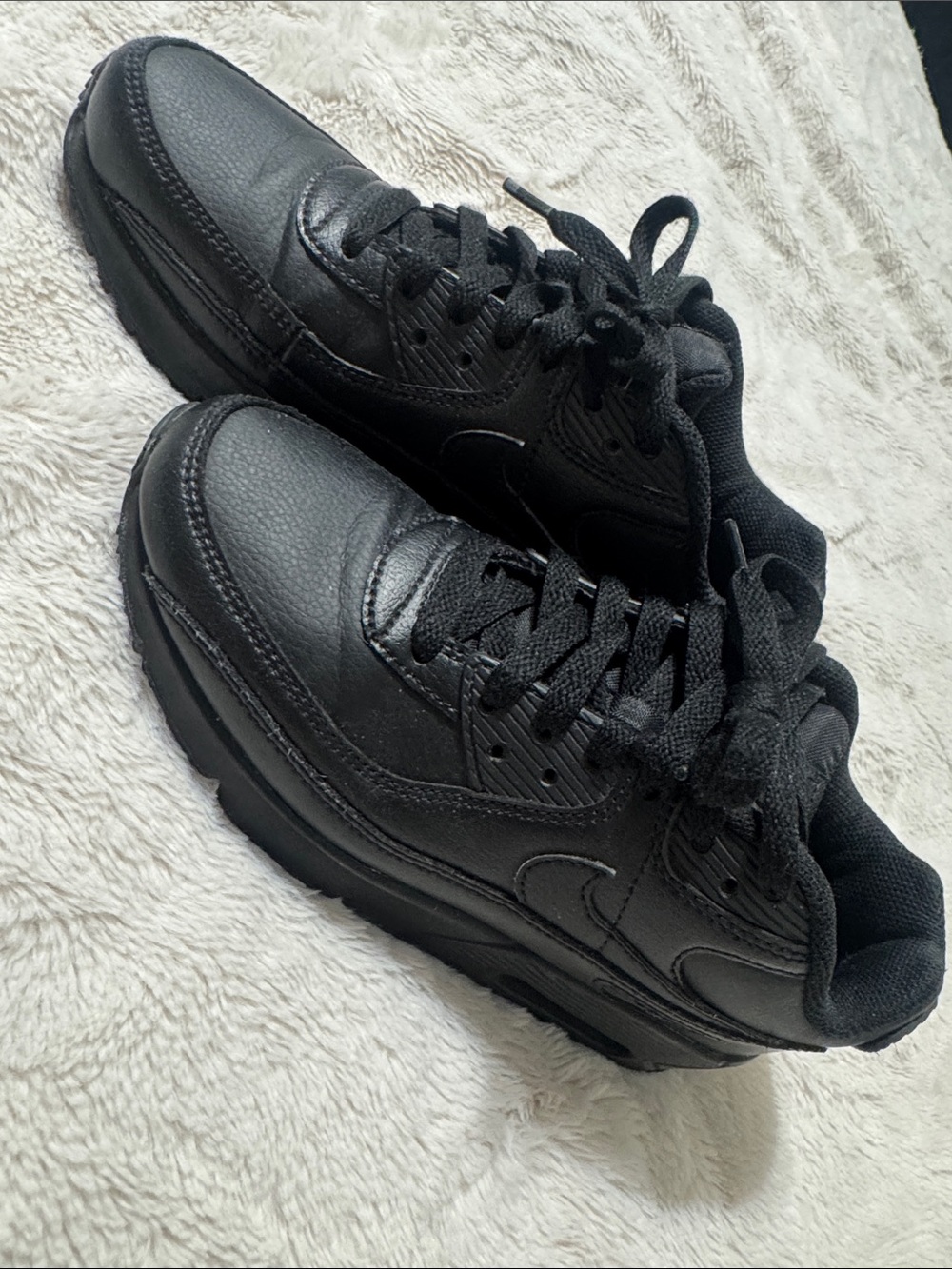 Nike All-Black Leather Low-Top Sneakers